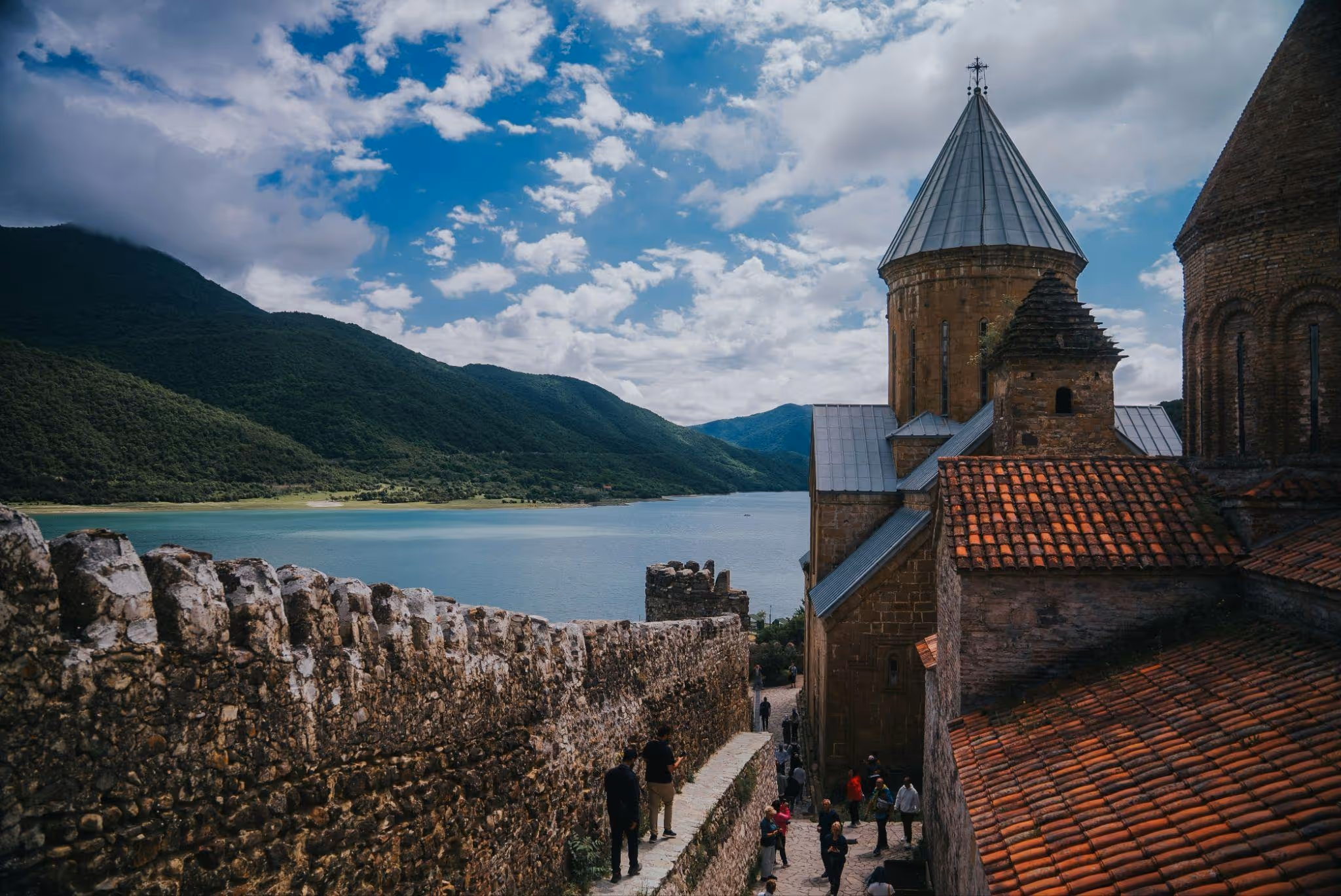source: https://unsplash.com/photos/a-turkish-flag-flying-in-the-sky-over-a-rocky-landscape-oC_jXPe4vC4