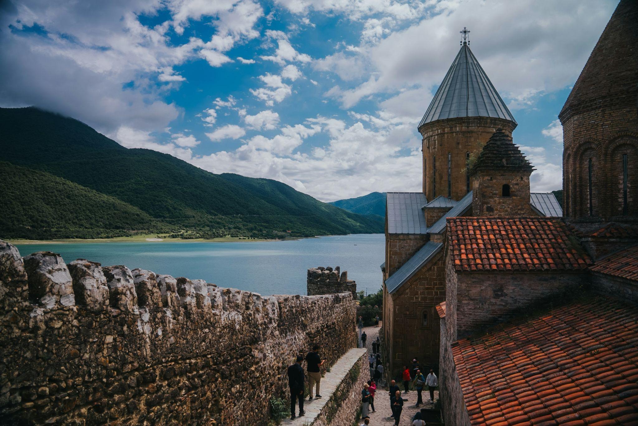 source: https://unsplash.com/photos/a-turkish-flag-flying-in-the-sky-over-a-rocky-landscape-oC_jXPe4vC4