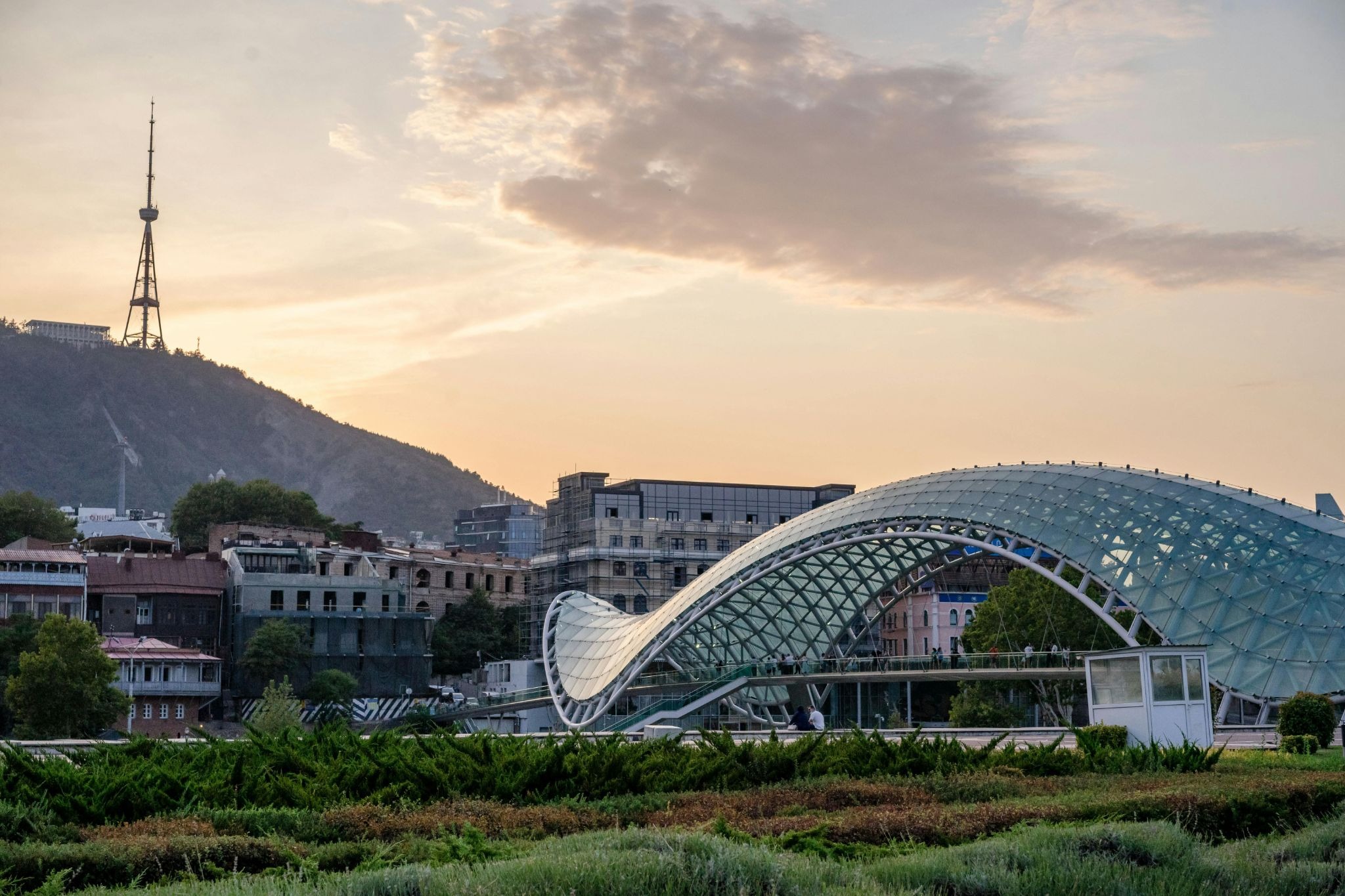 source: https://www.pexels.com/photo/a-modern-design-train-station-near-green-grass-9397581/