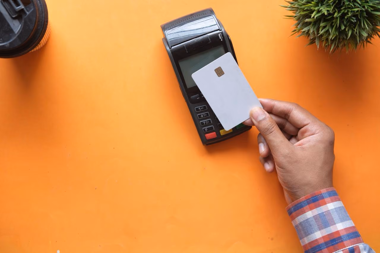 Premium credit card resting on travel documents