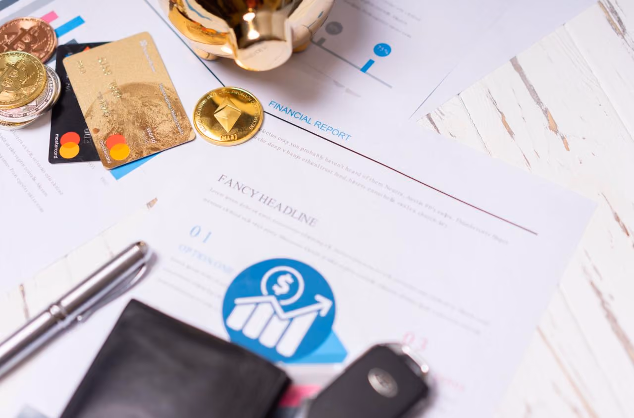 Cryptocurrency coins with financial report and payment card for analysis