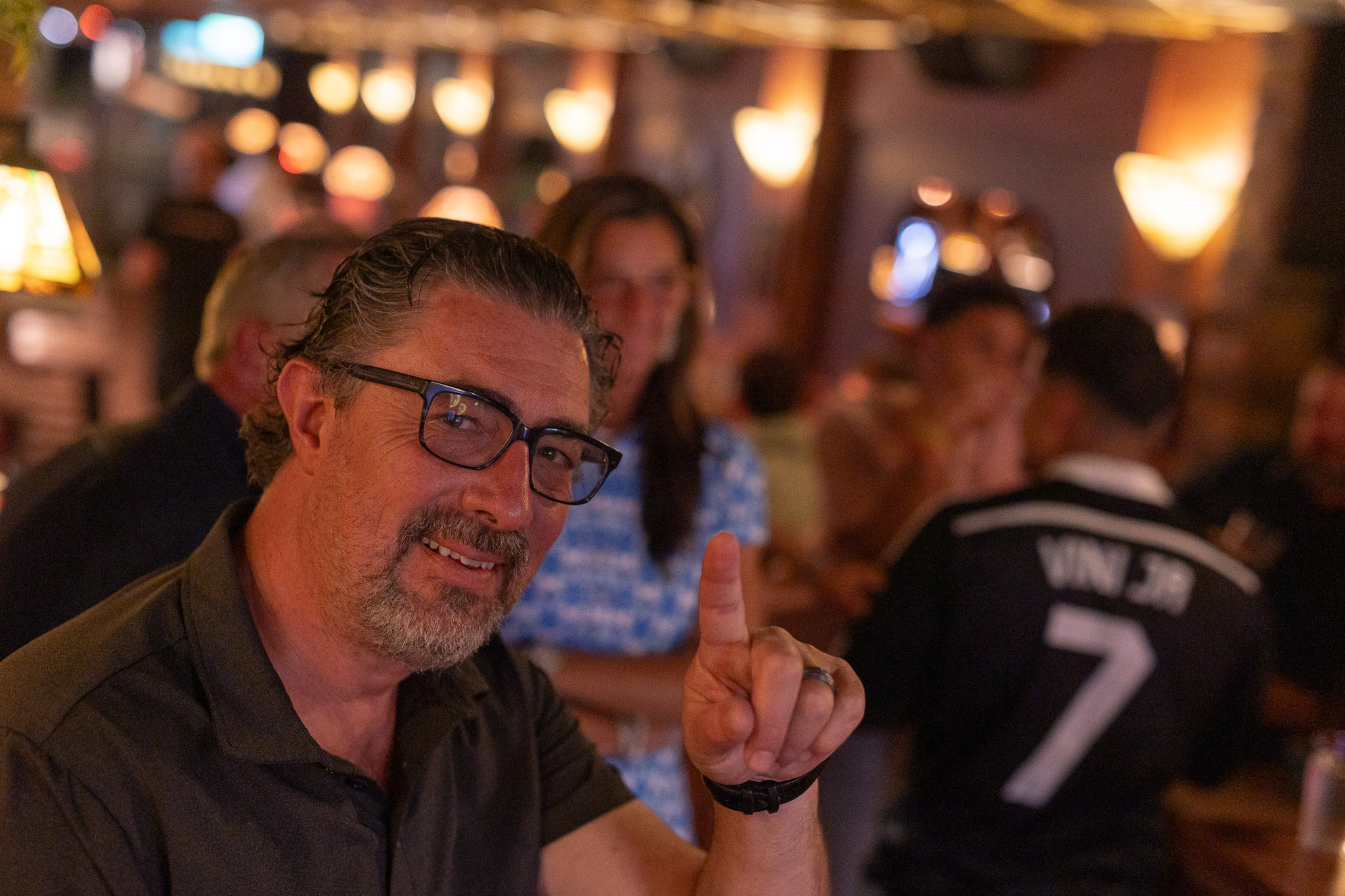 A guest pointing at the camera at Red Rabbit Pub Oslo
