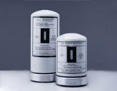 Two white cylindrical gas mask filter cartridges side by side on a plain background.