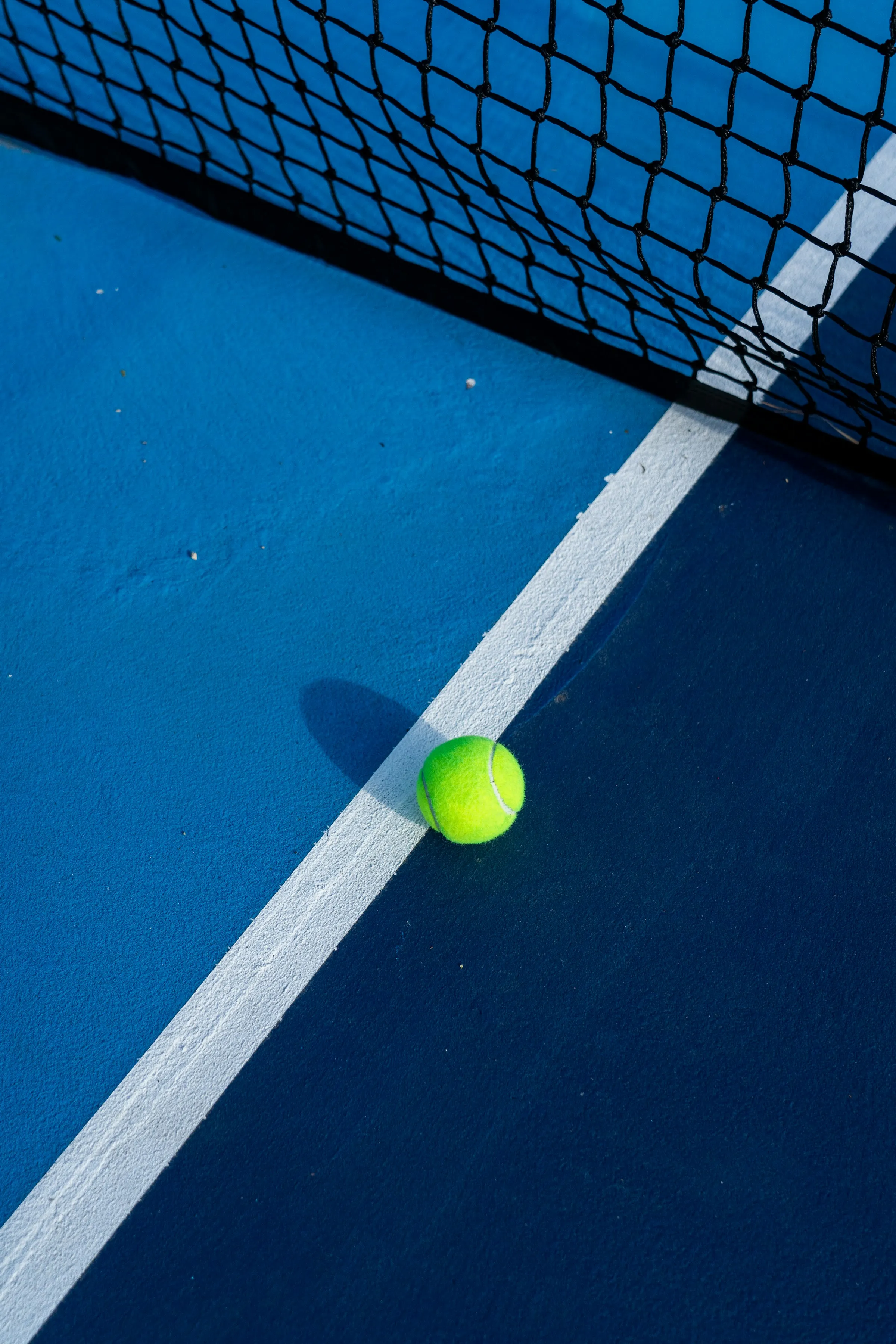 Ball on Minimal Blue Padel Court
