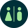 A vectorized washroom icon in light green on a dark blue background.