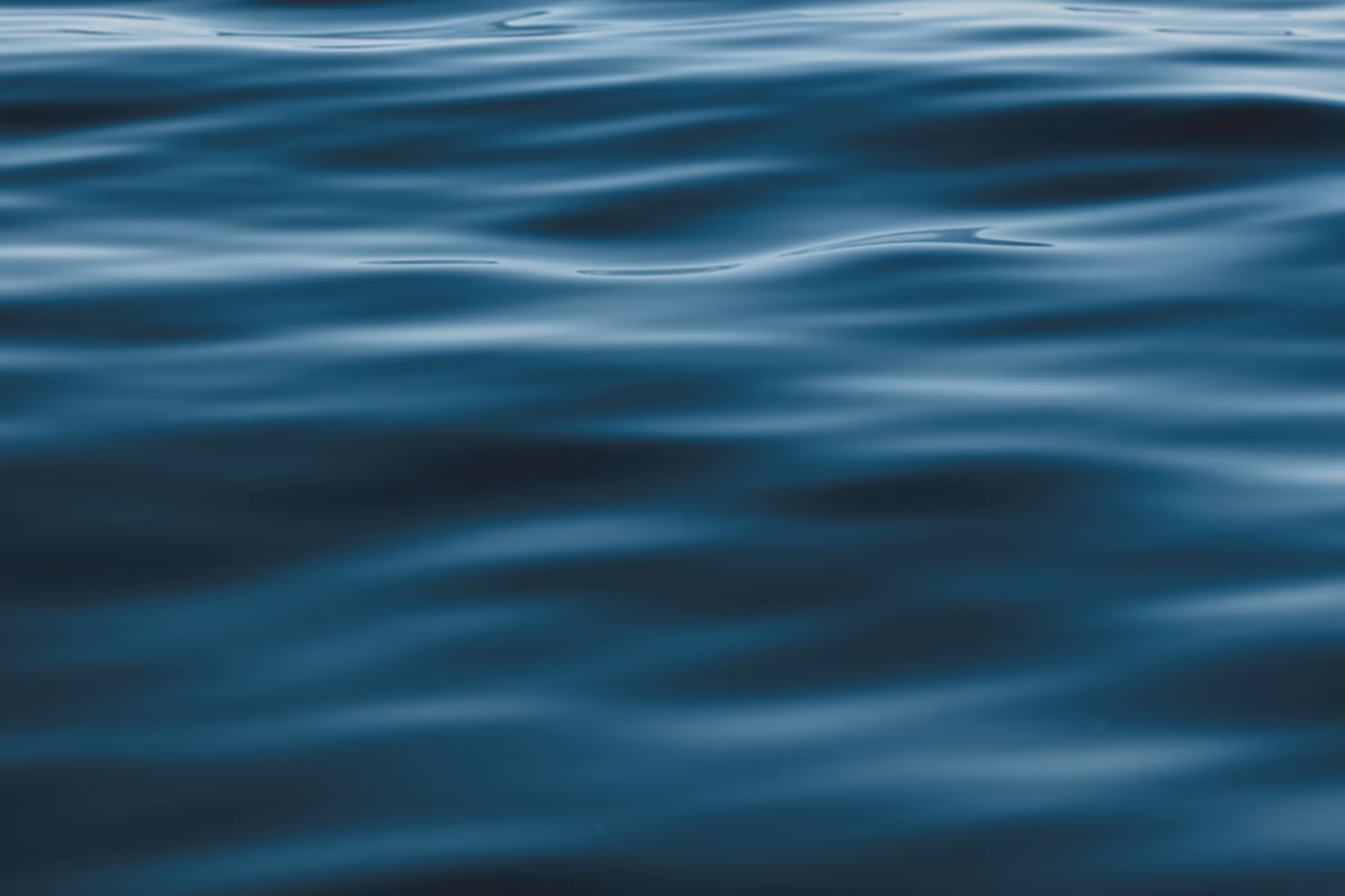 Ocean ripples. Photo sourced from: https://unsplash.com/photos/blue-shallow-water-LCaKuYefLQk