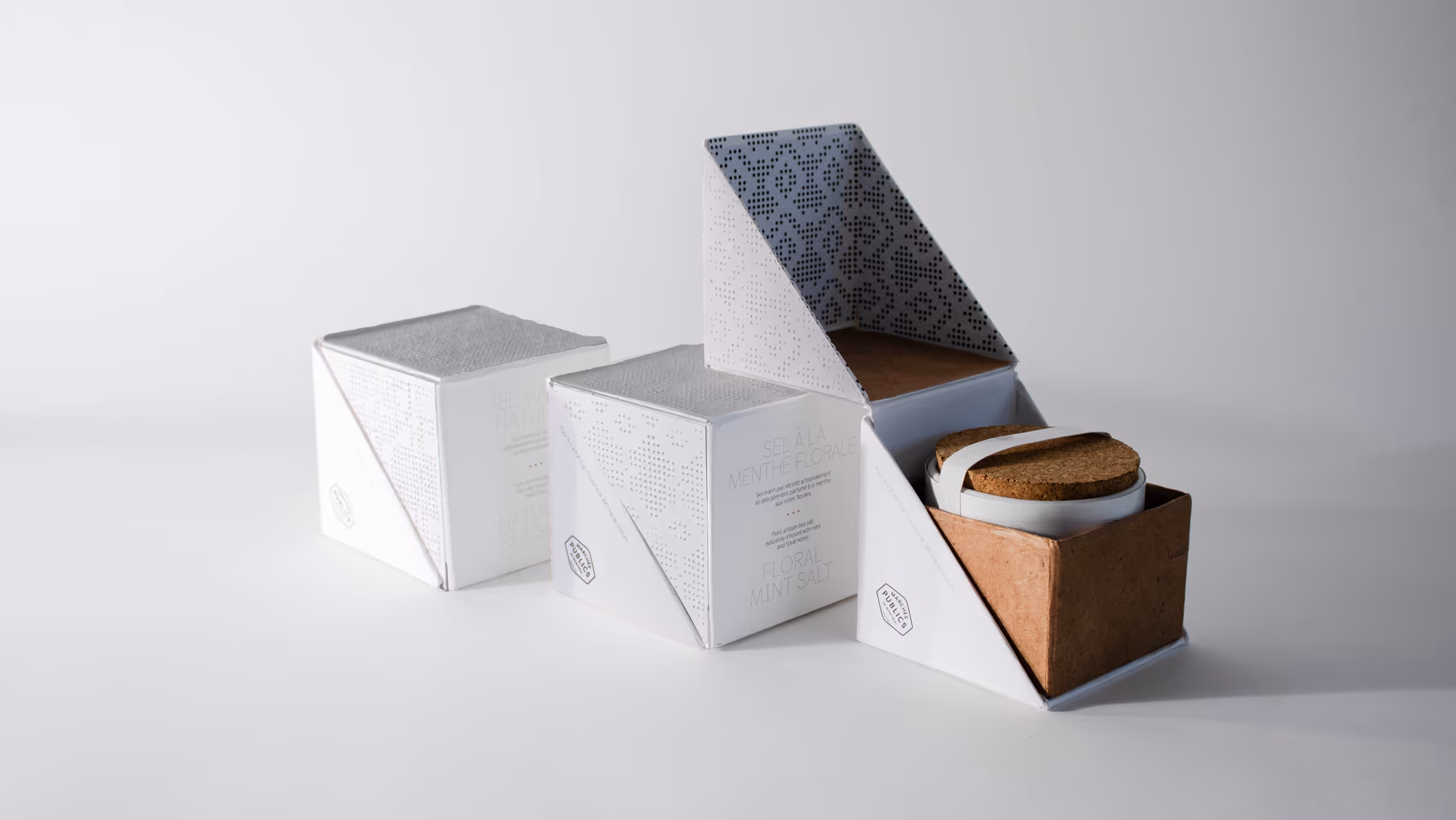 An artifact shot of the series of sea salt packaging.