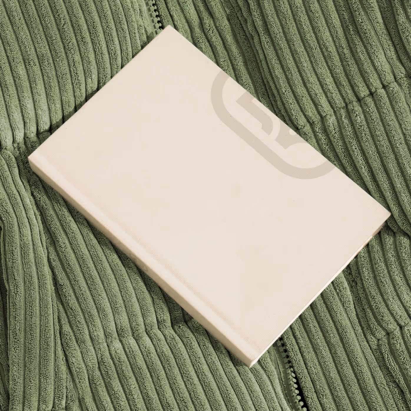 Ajenda notebook with cropping of logo on beige paper cover