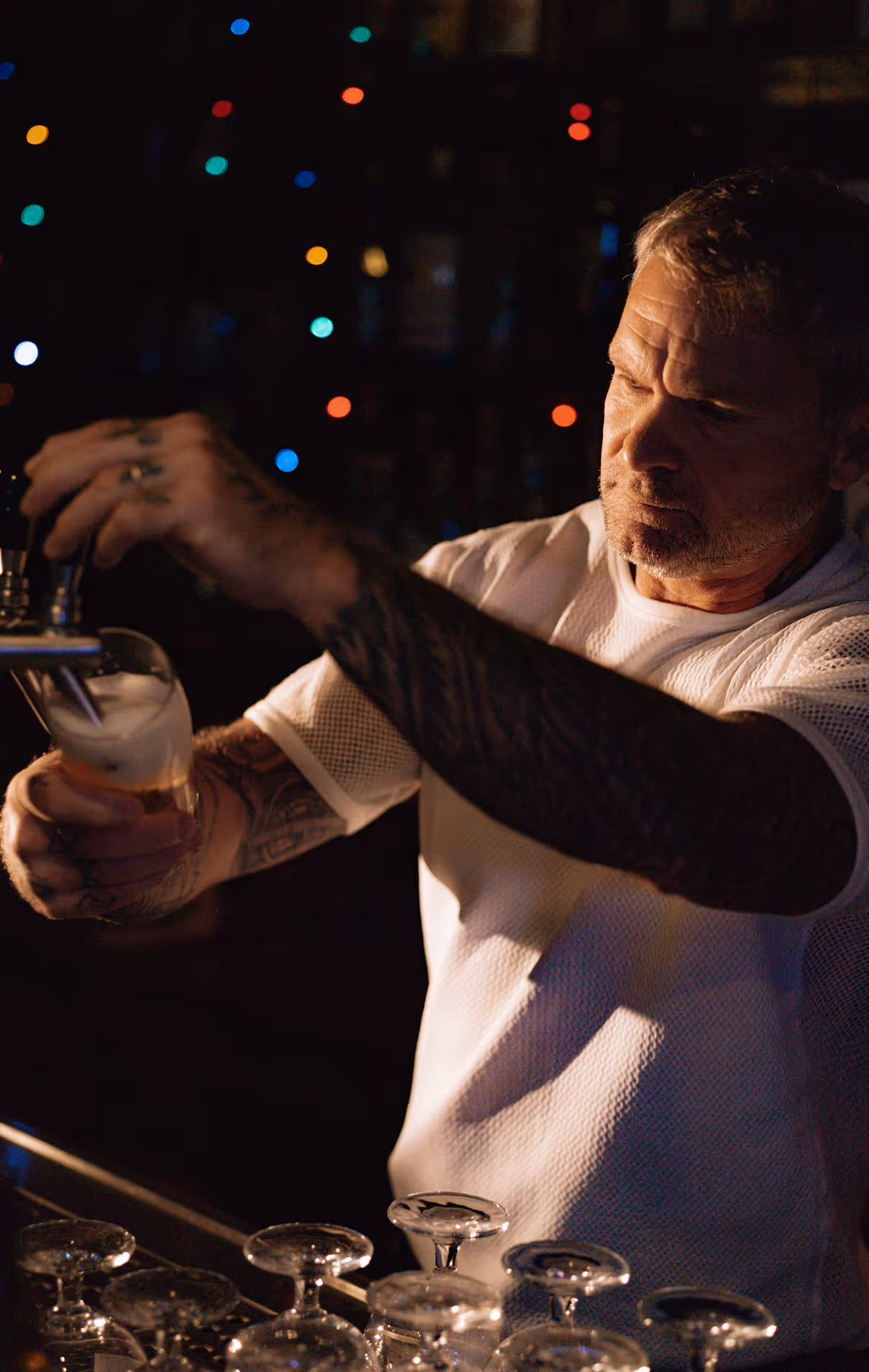 Photo credit death to stock, Augustin Farias. Image od man pouring draft beer