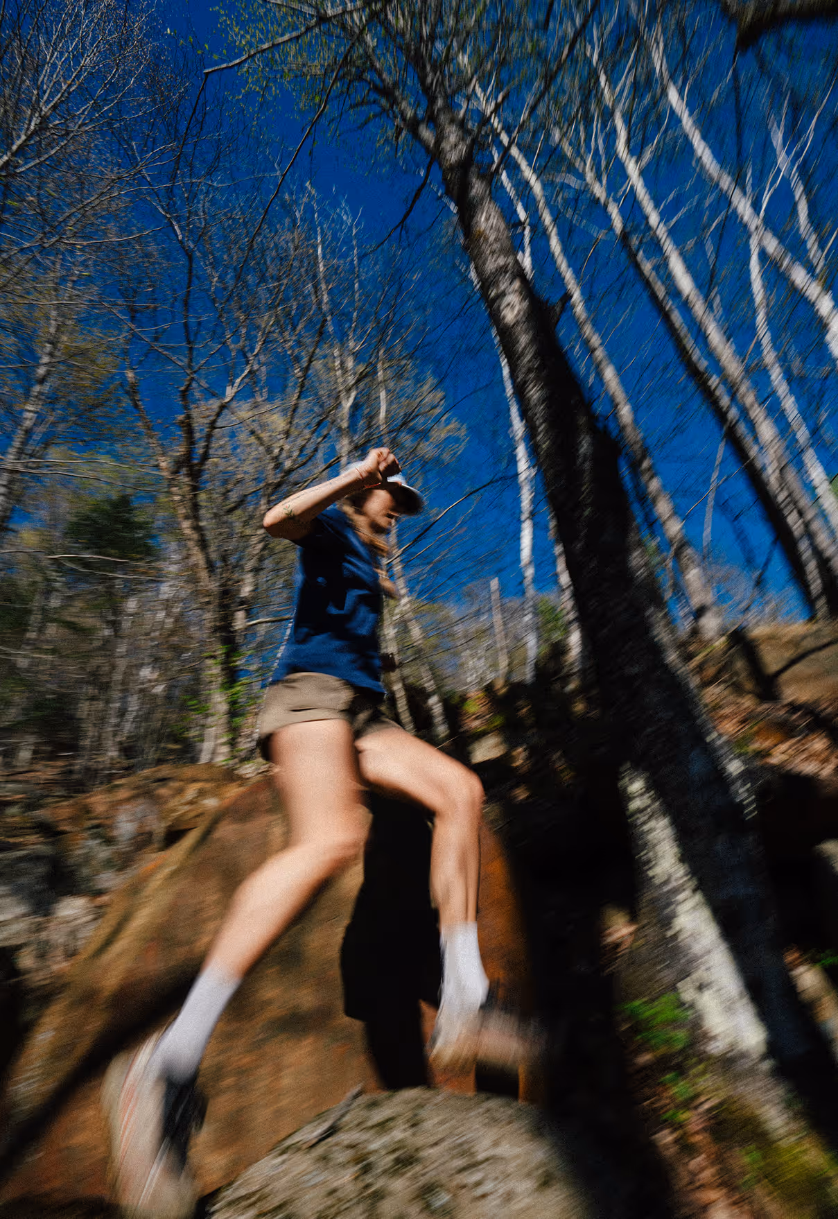 Photo credit Felix Burke. Woman running on rocks