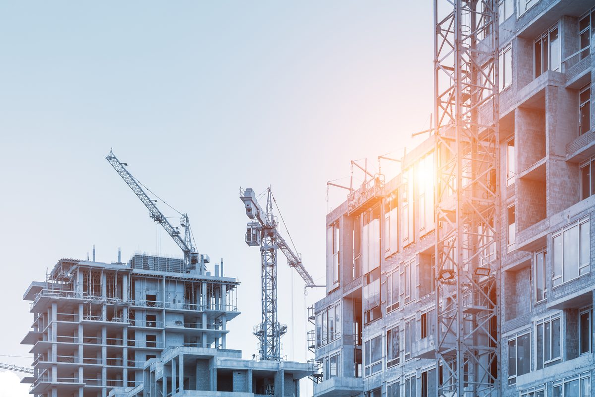 Construction cranes on an active development site