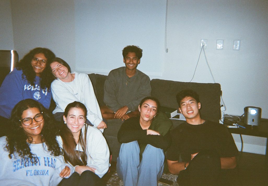A College Crew on a couch in a living room