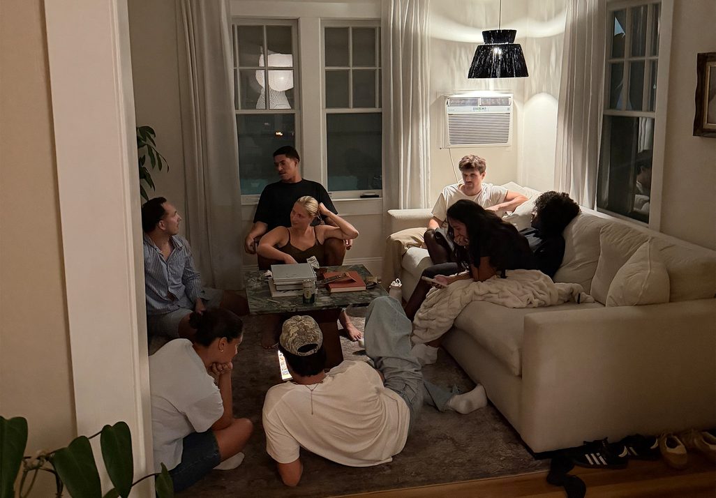 A Home Crew talking in a living room