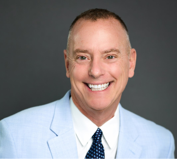 A professional head shot of Steve McAdams, the creator of the program