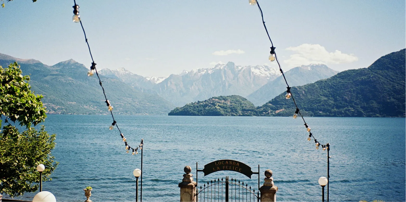 Festoon lights over the lakefront gate at Villa La Felice