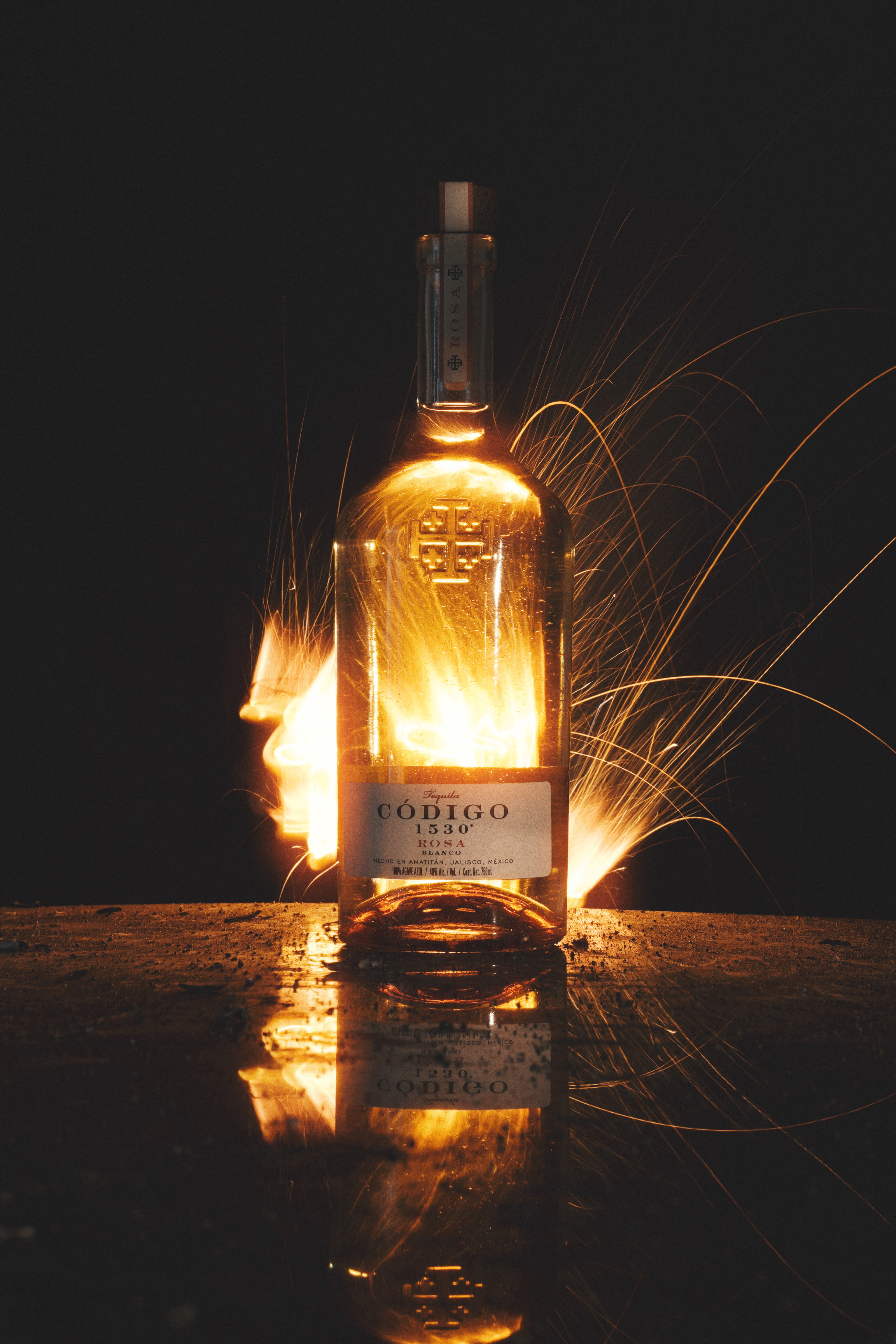 image of workers at machining station (for a manufacturing plant)