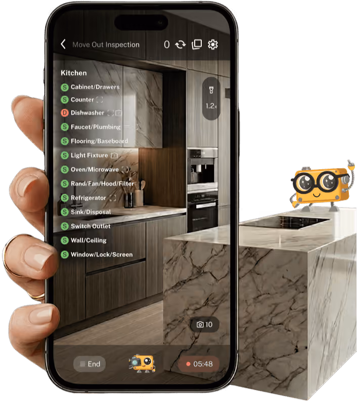 Smartphone displaying a kitchen inspection app showing a summary of standard use and wear in a modern kitchen.
