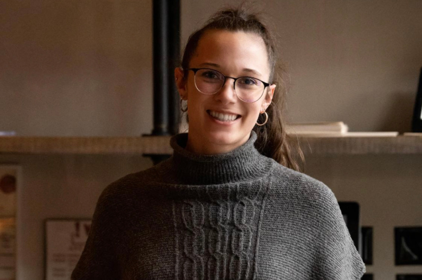 Olivia smiling with glasses
