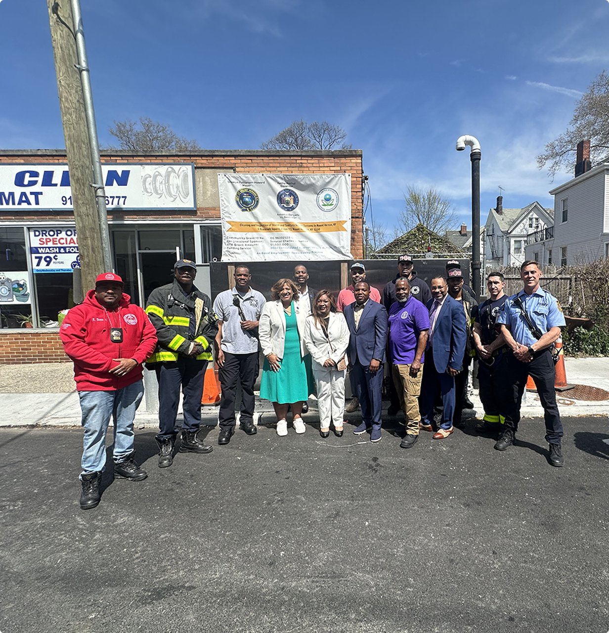 A group of people outside on a street