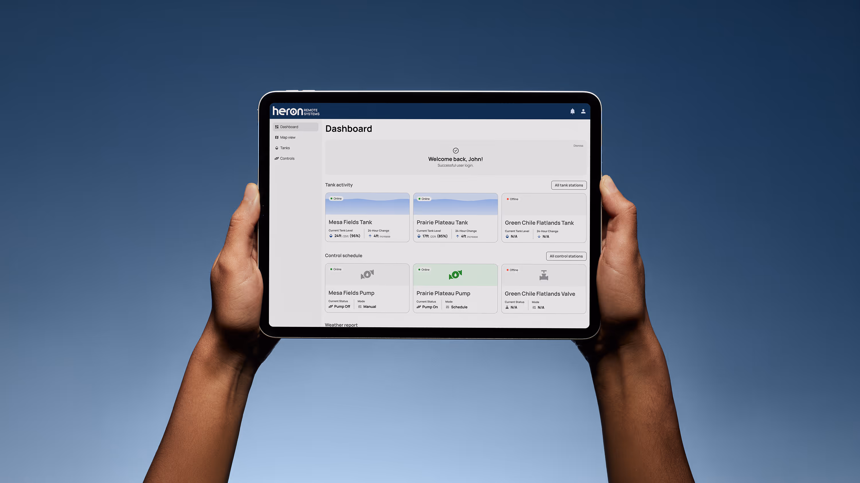 A person's arms holding up a tablet with Heron's web app dashboard on it, with a blue gradient background behind it.