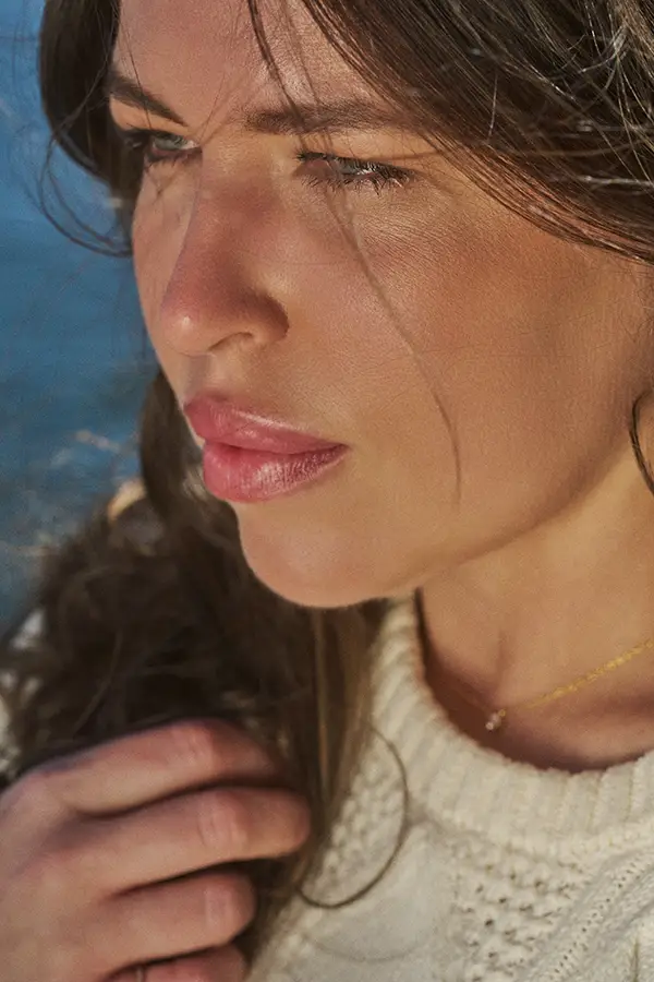 Woman with full youthful skin representing CAMI Sculptra collagen results
