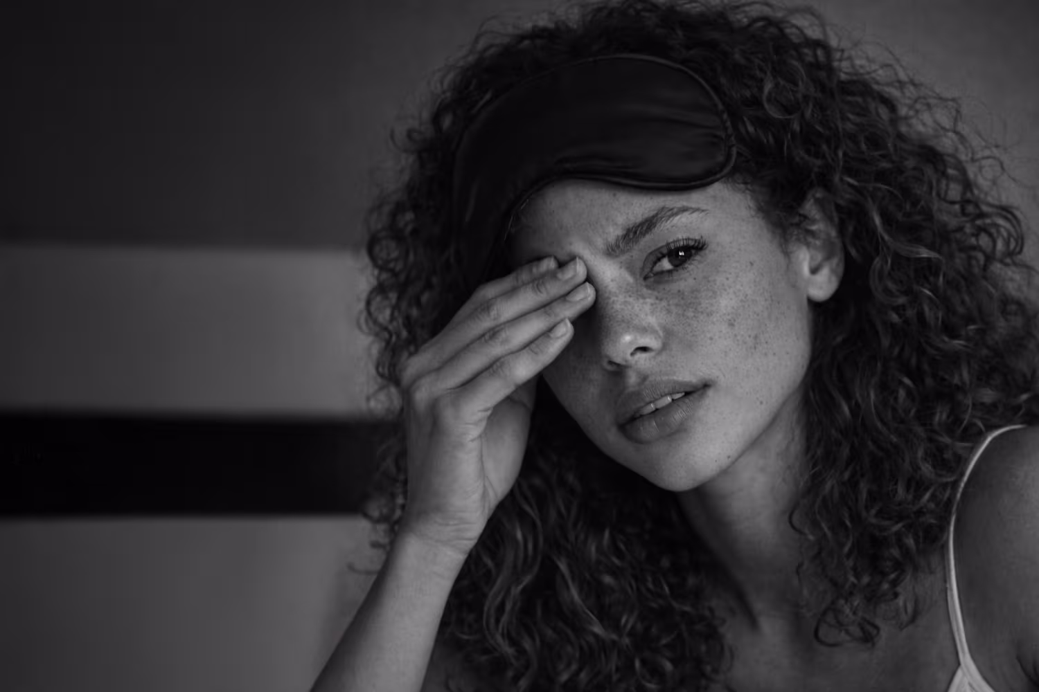 Black and white portrait representing sleep disturbances and hormonal insomnia concern at CAMI