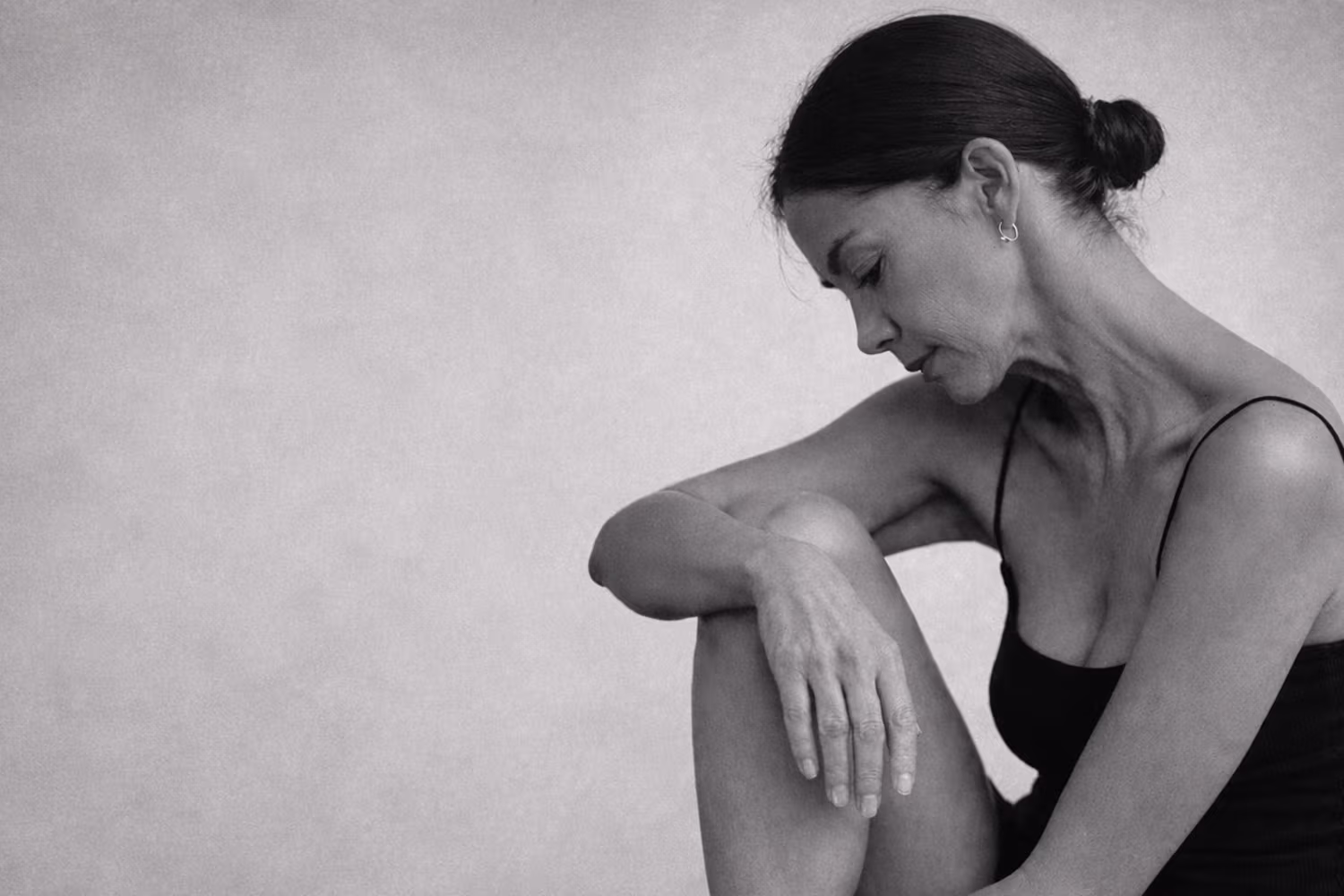 Black and white portrait representing low libido and hormonal wellness concern at CAMI