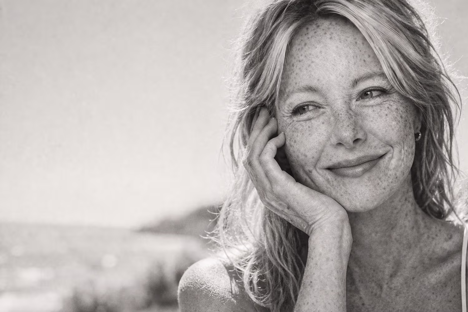 Black and white portrait representing sun spots and age spot pigmentation concern at CAMI