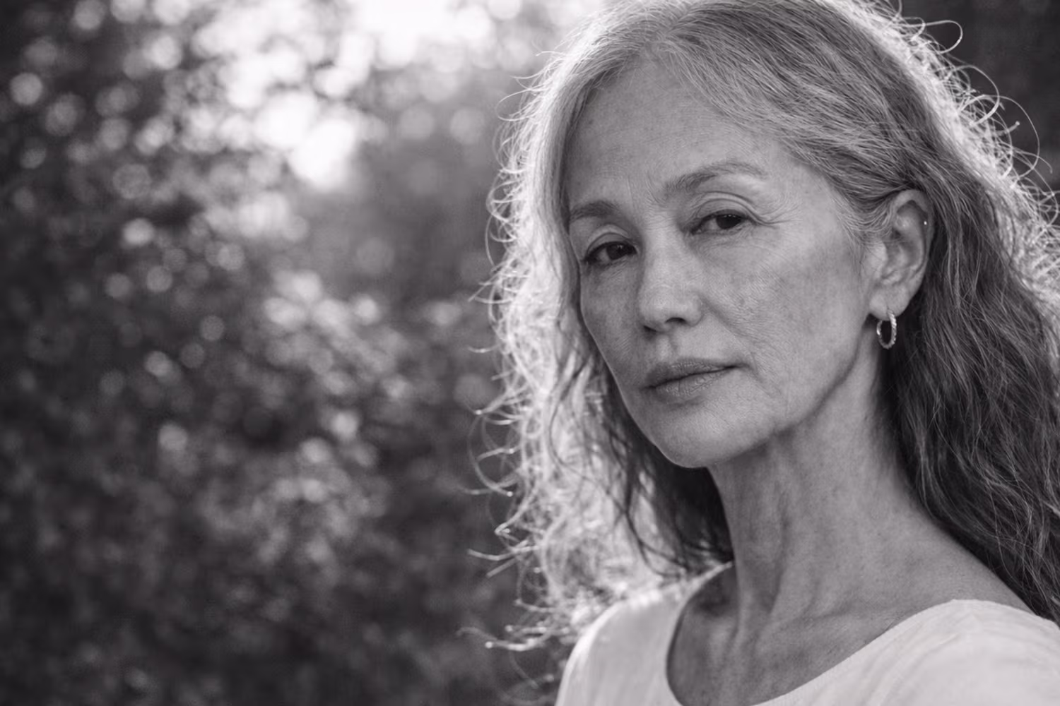 Black and white portrait representing facial volume loss and deflated midface concern at CAMI