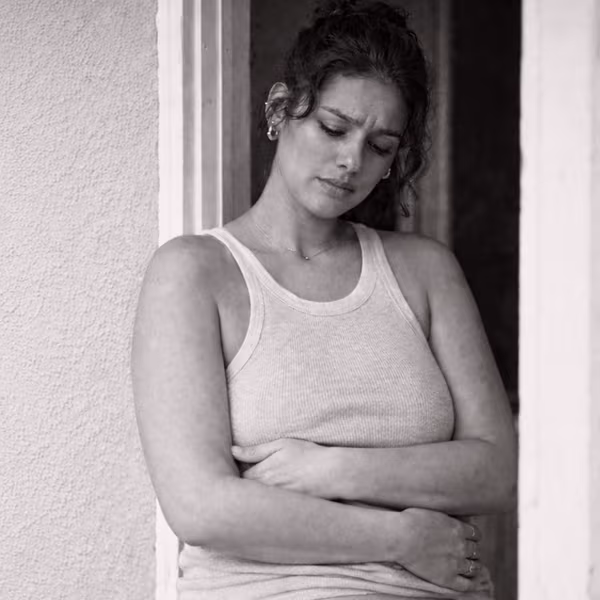 Black and white portrait representing slow metabolism and weight management concern at CAMI