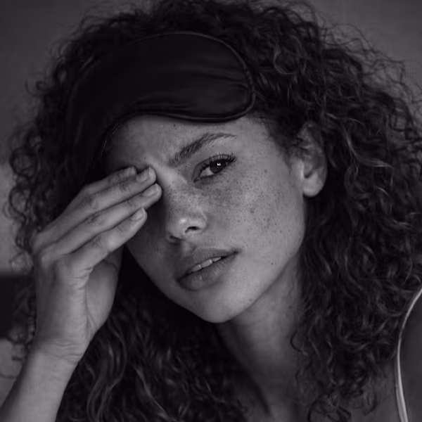 Black and white portrait representing sleep disturbances and hormonal insomnia concern at CAMI