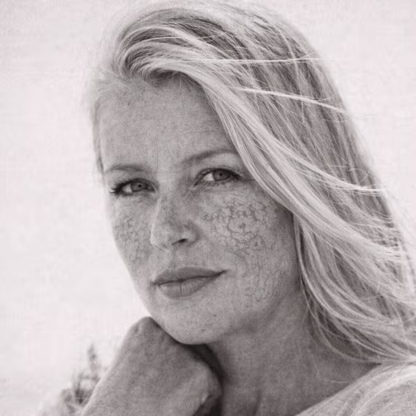 Black and white close-up representing broken capillaries and visible facial redness concern at CAMI