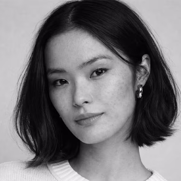 Black and white portrait representing uneven skin tone and pigmentation irregularity concern at CAMI