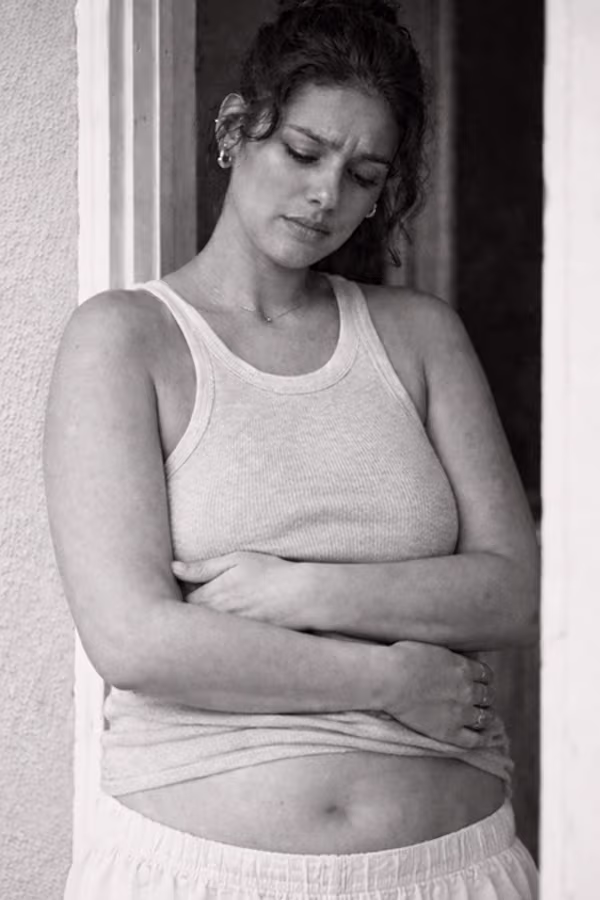 Black and white portrait representing slow metabolism and weight management concern at CAMI