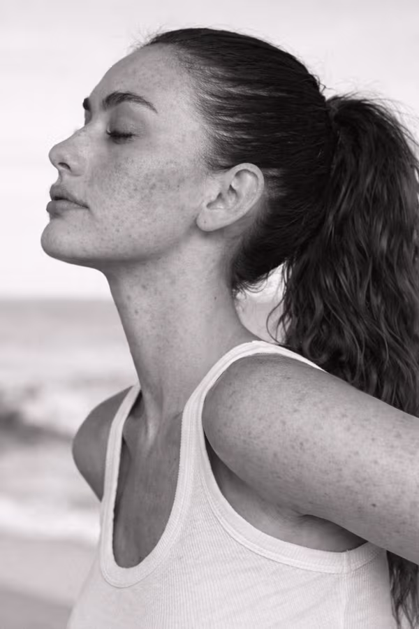 Black and white close-up representing uneven skin texture and surface irregularity concern at CAMI