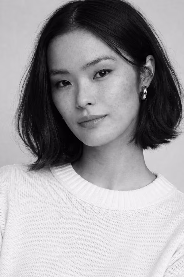 Black and white portrait representing uneven skin tone and pigmentation irregularity concern at CAMI