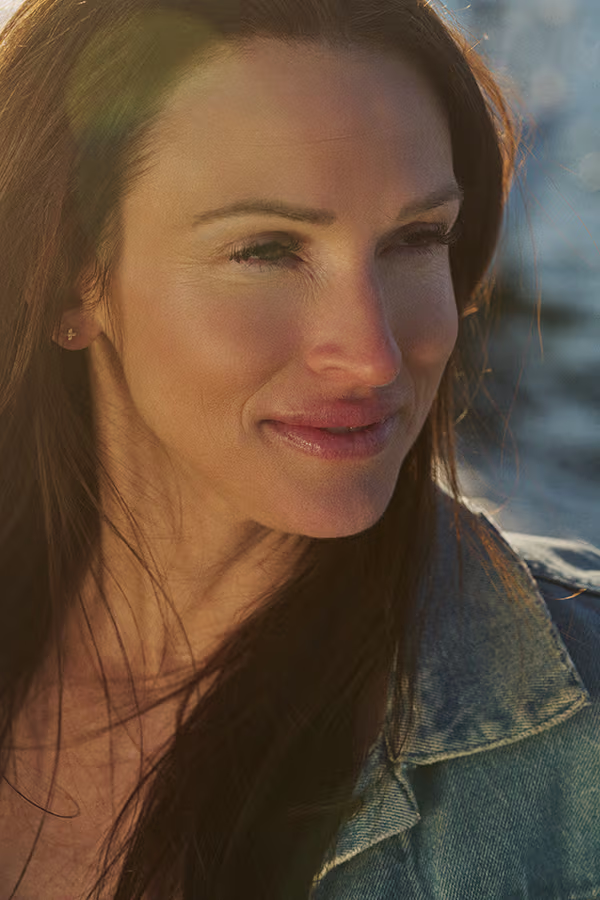 Woman with radiant skin representing CAMI HydraFacial results