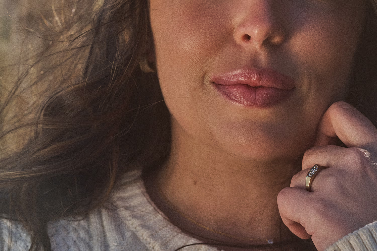 Woman with natural full lips photographed at CAMI for lip filler treatment