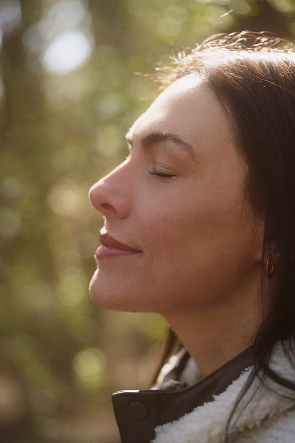 Woman with bright even skin representing CAMI chemical peel results