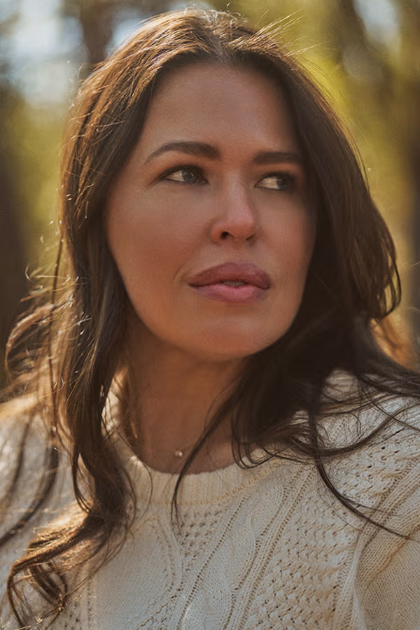 Woman with natural full facial contours representing CAMI dermal filler results