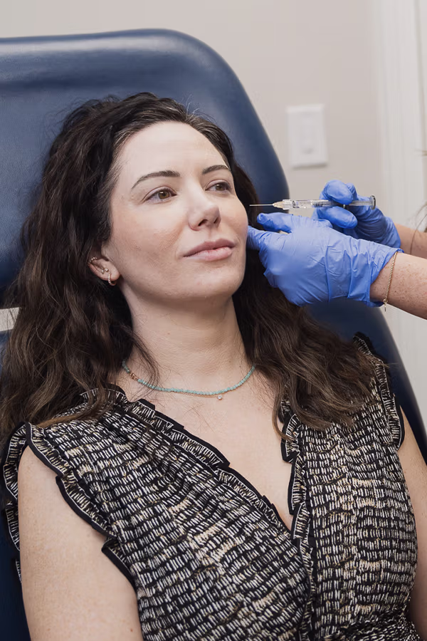 CAMI provider performing cheek filler treatment for midface volume restoration and structural support