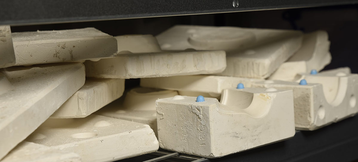 Assorted stacks of plaster and gypsum waste, which go into making sustainable Eralith tiles. 