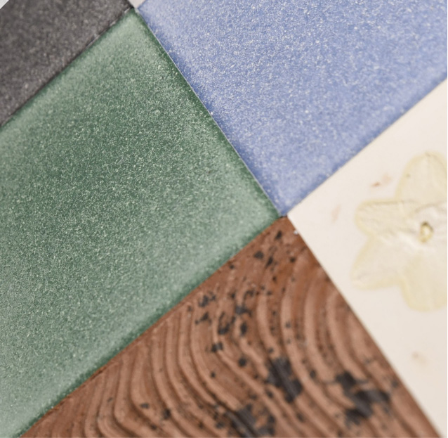 A close up of four Eralith tiles from Dekiln. 