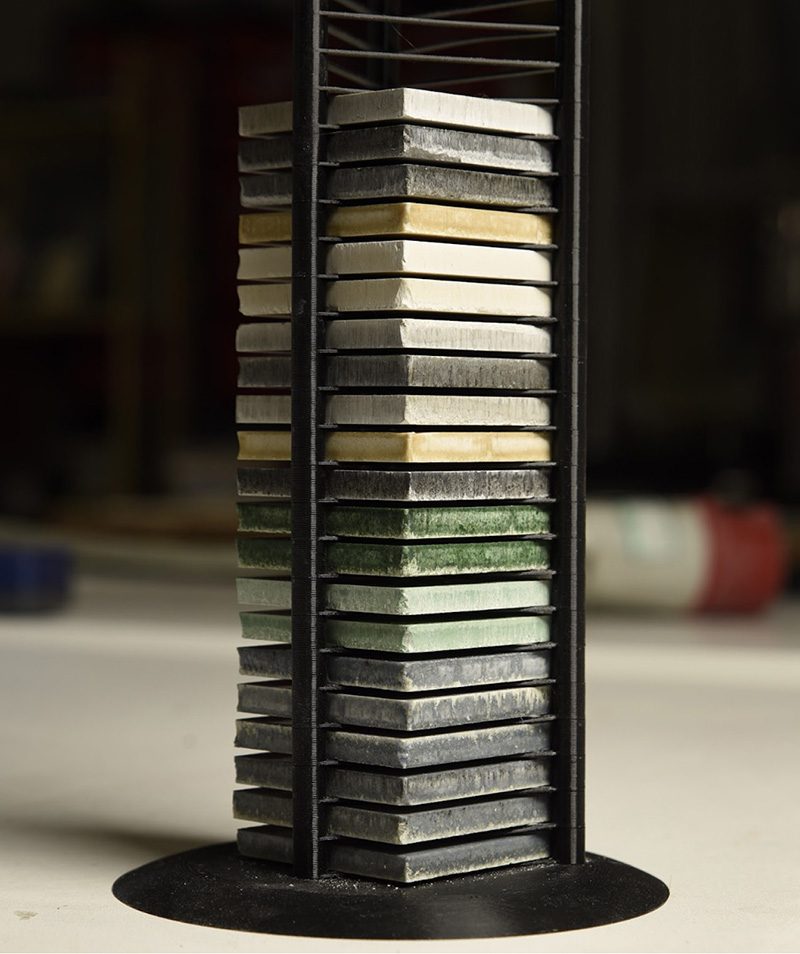 A stack of multi-coloured Eralith tiles.