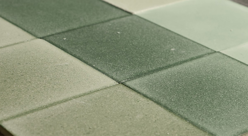 A close of different shades of light-green Eralith tiles.