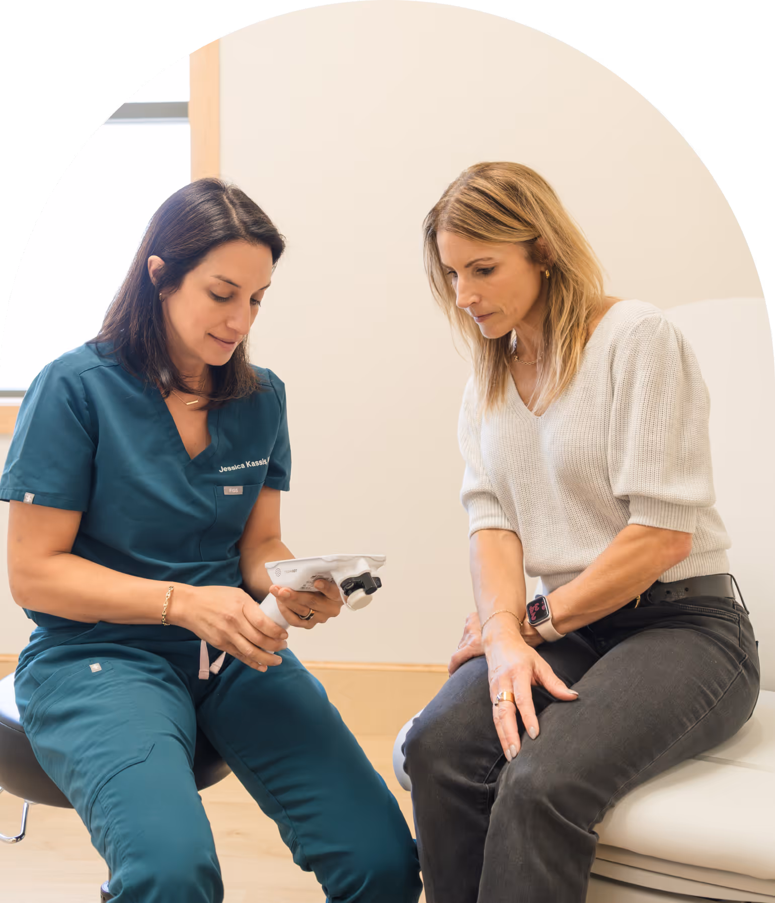 Dr. Kassis meeting with a patient at Radiant Women's Health