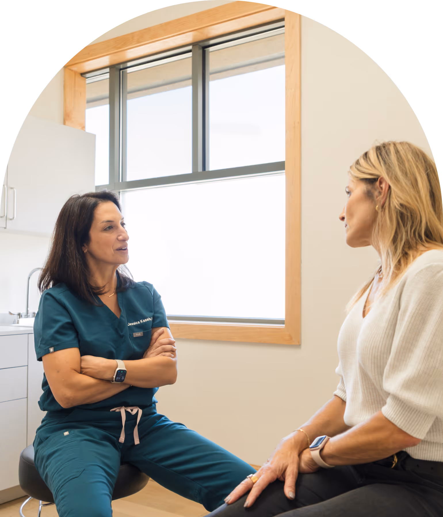 Dr. Kassis meeting with a patient at Radiant Women's Health