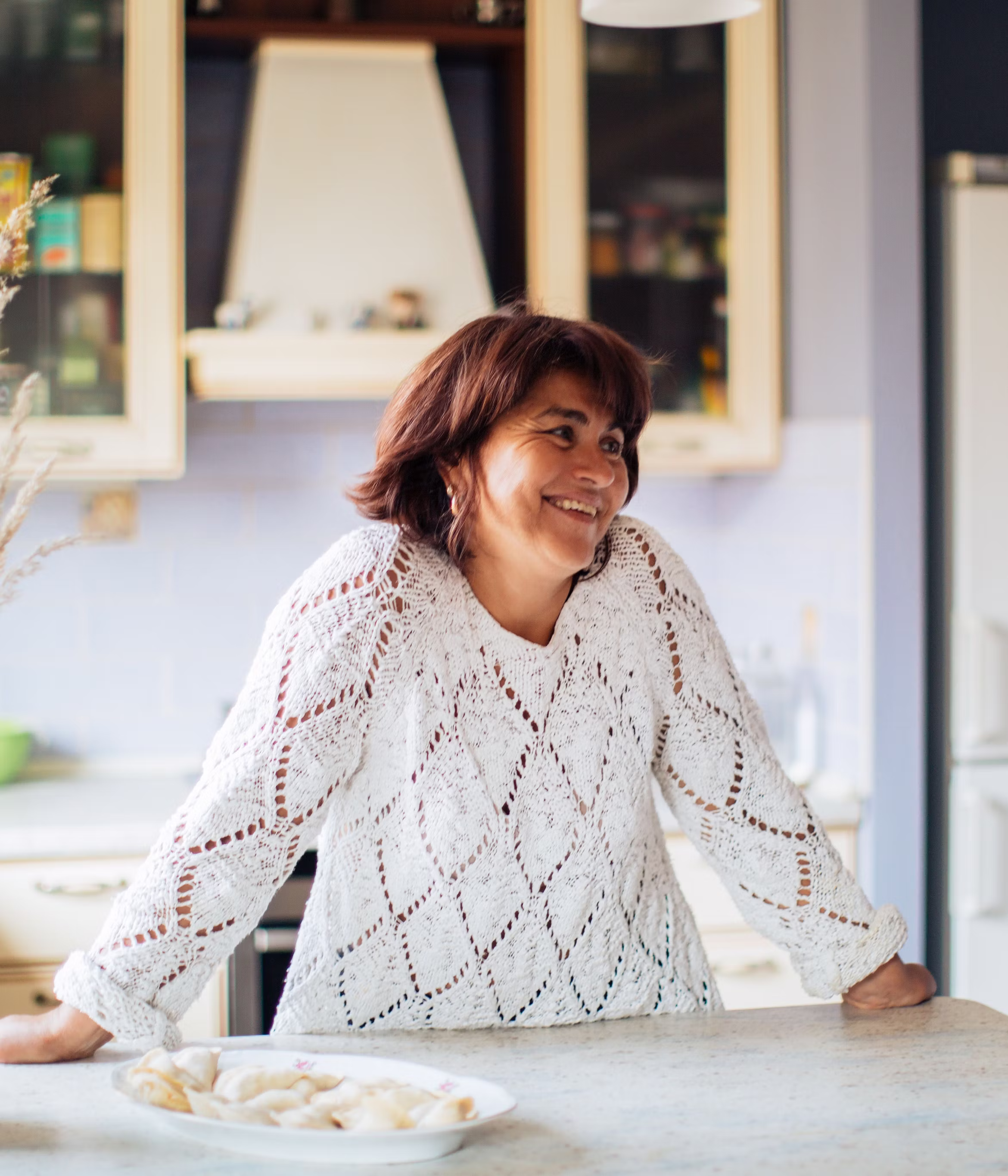 Smiling woman after receiving healthcare from Radiant Women's Health