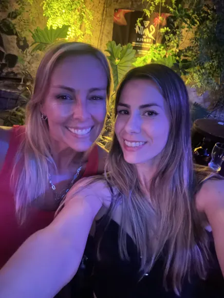 Two teammates at a company event
