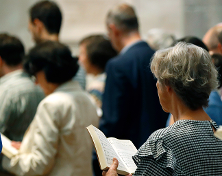 A church congregation worshipping together, representing the church donors represented in the 2026 Giving in Faith report.